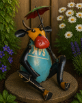 COW HOLDING A UMBRELLA